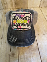 “My Broomstick Runs on Cupcakes” trucker hat